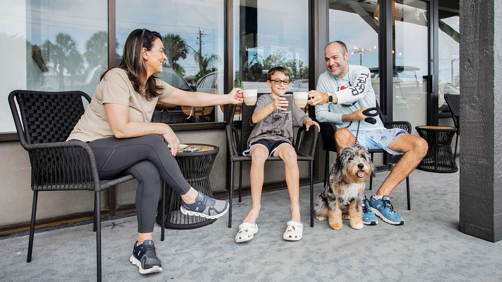 Family Outside Dog Team of creative people meeting in a cafe