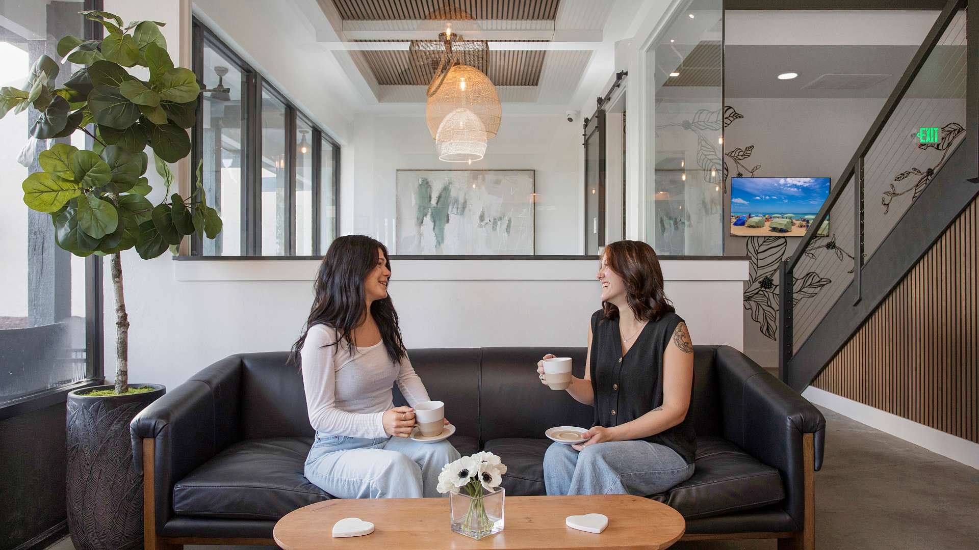 Girls Couch Two Business Women Meeting at Coffee Break
